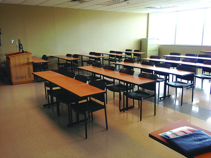 tables and chairs in classroom